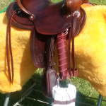 New children's western leather saddle by OW Saddles. view of right side of saddle and cinch